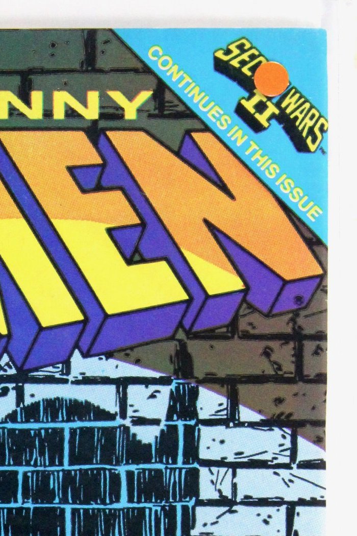 The Uncanny X-Men #196 – Marvel (1985) 9.0 VF/NM "Marvel Super Heroes" Secret Wars II | Chris Claremont story | Terry Austin cover