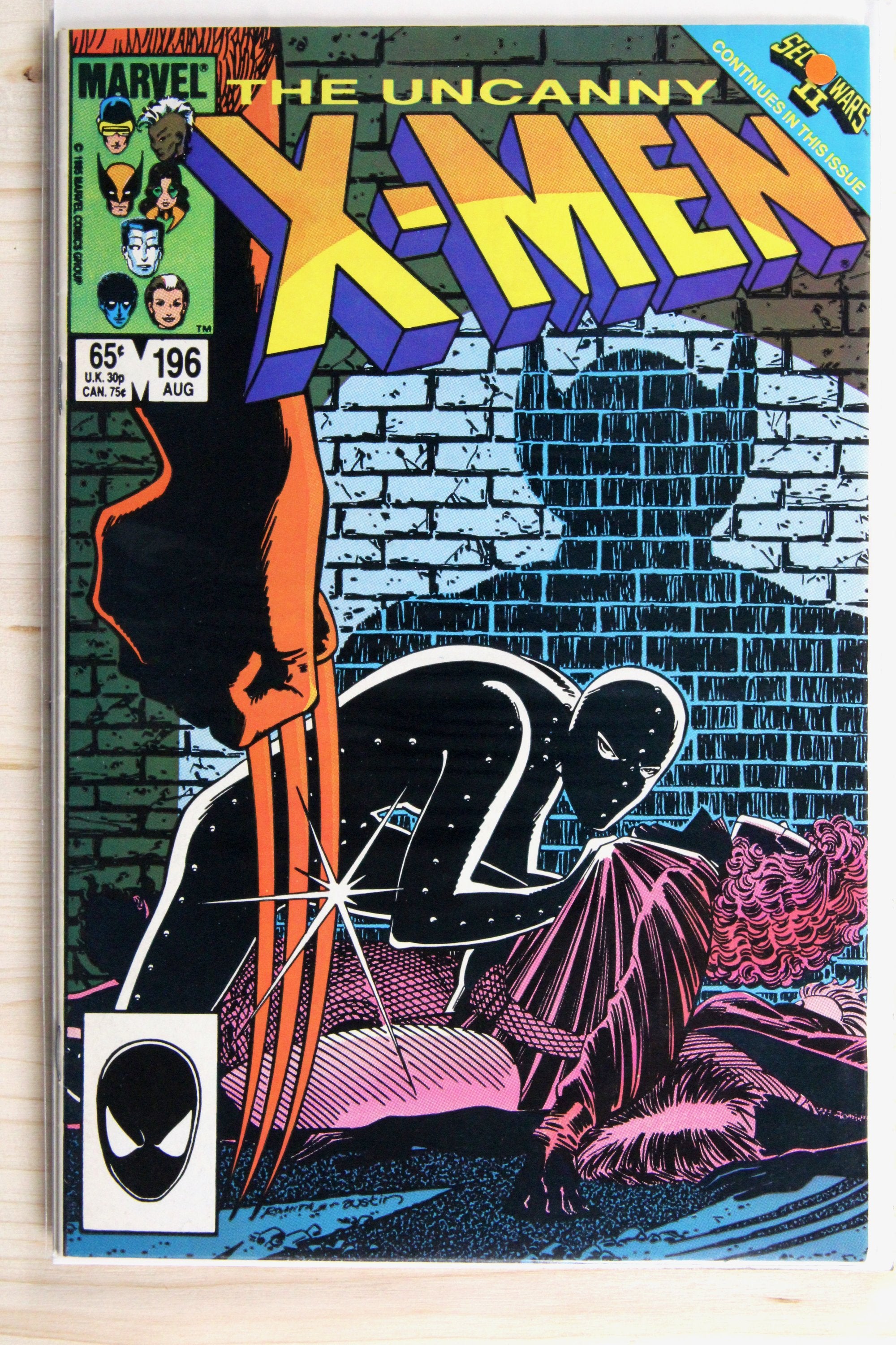The Uncanny X-Men #196 – Marvel (1985) 9.0 VF/NM "Marvel Super Heroes" Secret Wars II | Chris Claremont story | Terry Austin cover