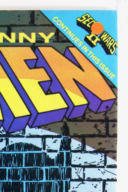 The Uncanny X-Men #196 – Marvel (1985) 9.0 VF/NM "Marvel Super Heroes" Secret Wars II | Chris Claremont story | Terry Austin cover