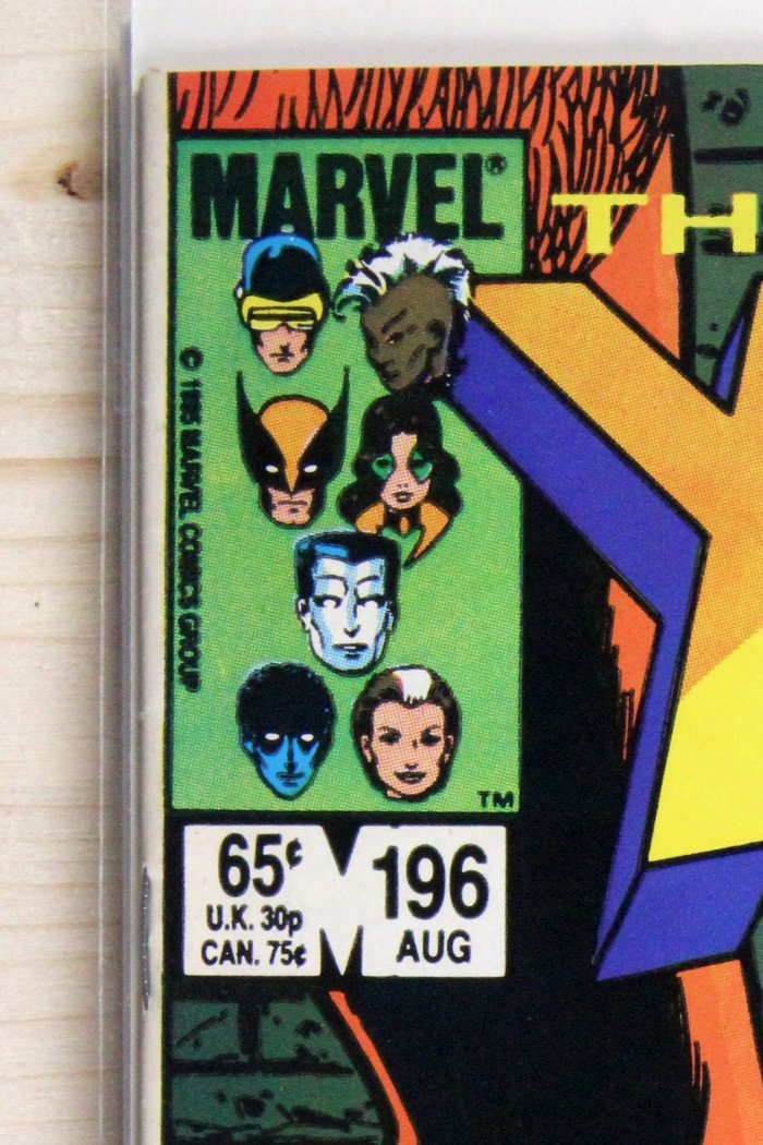 The Uncanny X-Men #196 – Marvel (1985) 9.0 VF/NM "Marvel Super Heroes" Secret Wars II | Chris Claremont story | Terry Austin cover